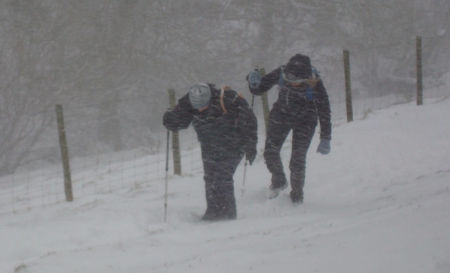 People braving a snow storm