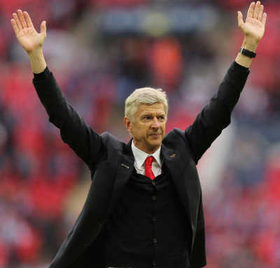 Arsene Wenger waves goodbye